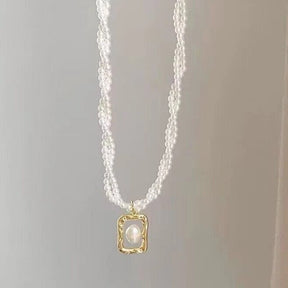 Colar Duplo de Pérolas com Pingente